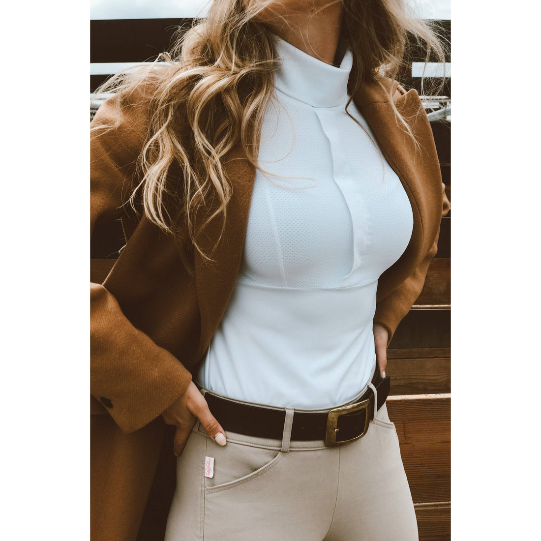 White | Haley, turtleneck sun shirt on model with a suede jacket