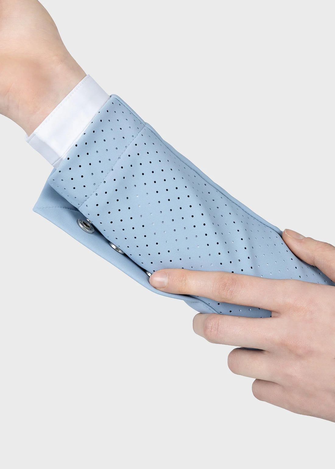 Aqua | Aura Show Jacket – MAXIMILIAN Equestrian, close-up of the perforated cuff detail
