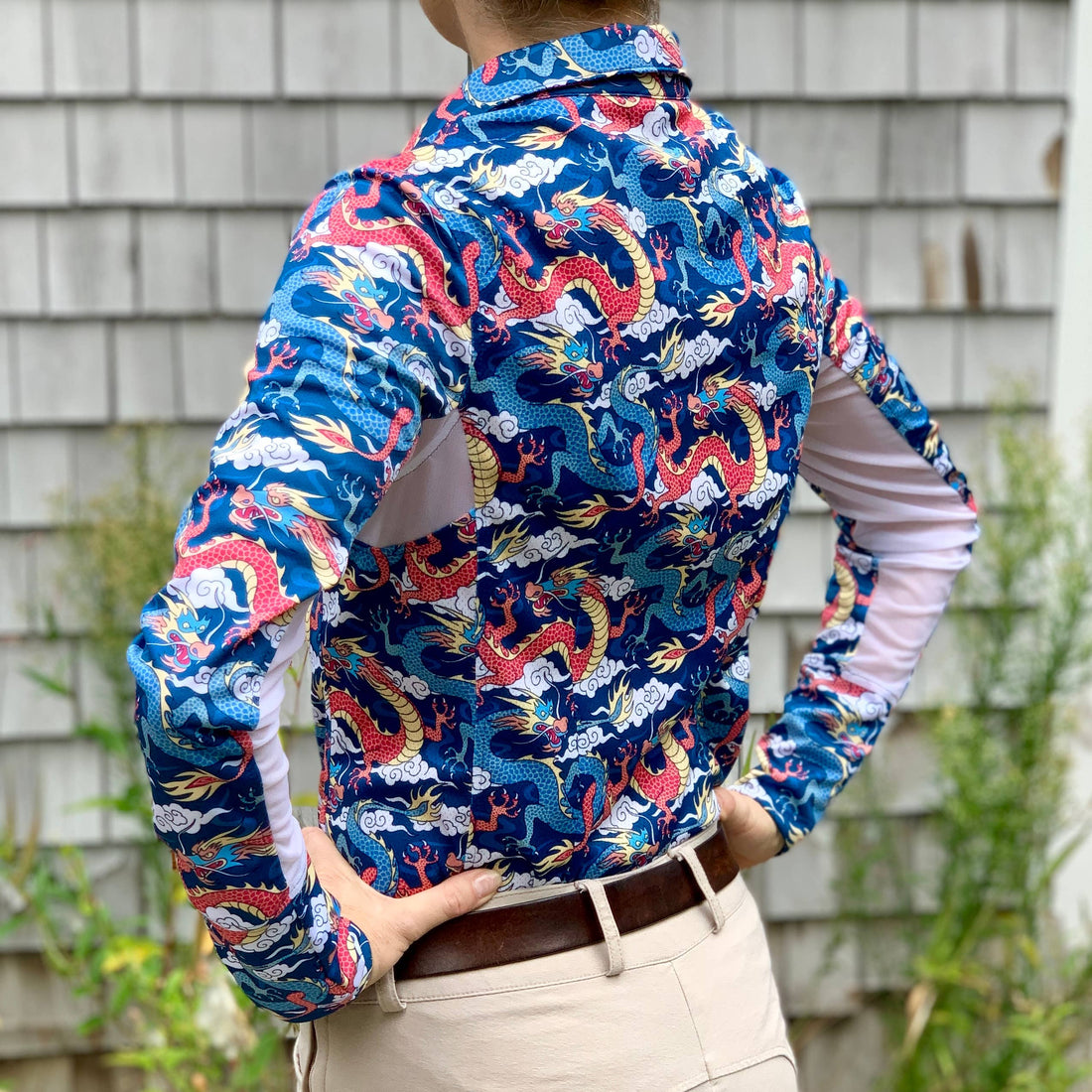 Blue/Red | Long Sleeve Athletic Polo - Dragons, back view on model showing the dragon print
