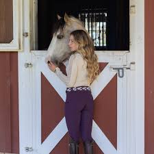 Latte | Halter Ego Annabelle Long Sleeve Lace Riding Top, on model standing with a horse at a stall door