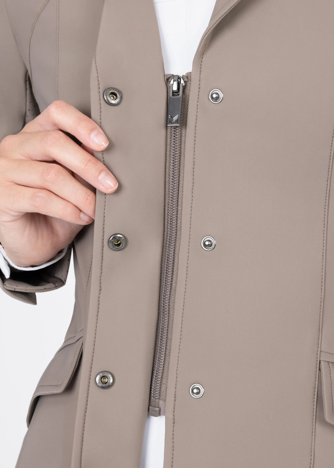 Taupe | Aura Show Jacket – MAXIMILIAN Equestrian, close-up of the zip and snap front closure