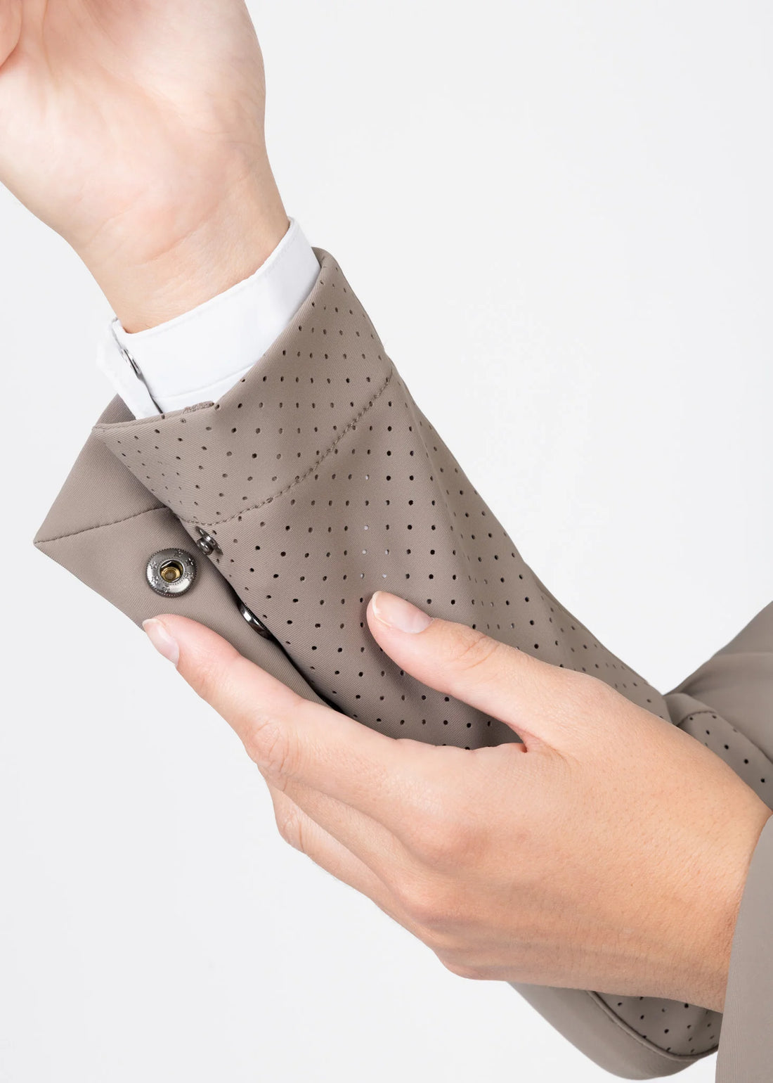 Taupe | Aura Show Jacket – MAXIMILIAN Equestrian, close-up of the perforated cuff detail