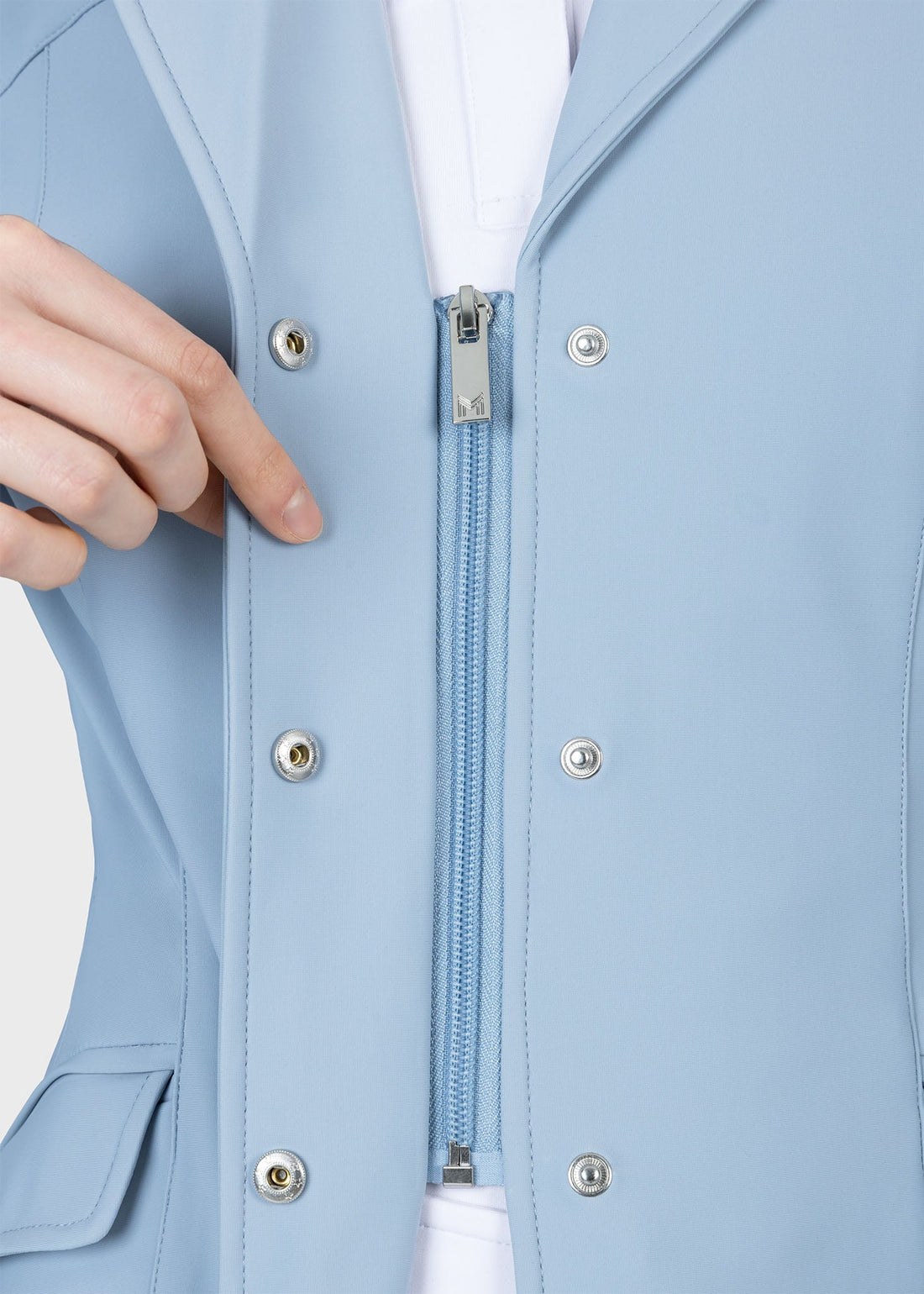 Aqua | Aura Show Jacket – MAXIMILIAN Equestrian, close-up of the zip and snap front closure