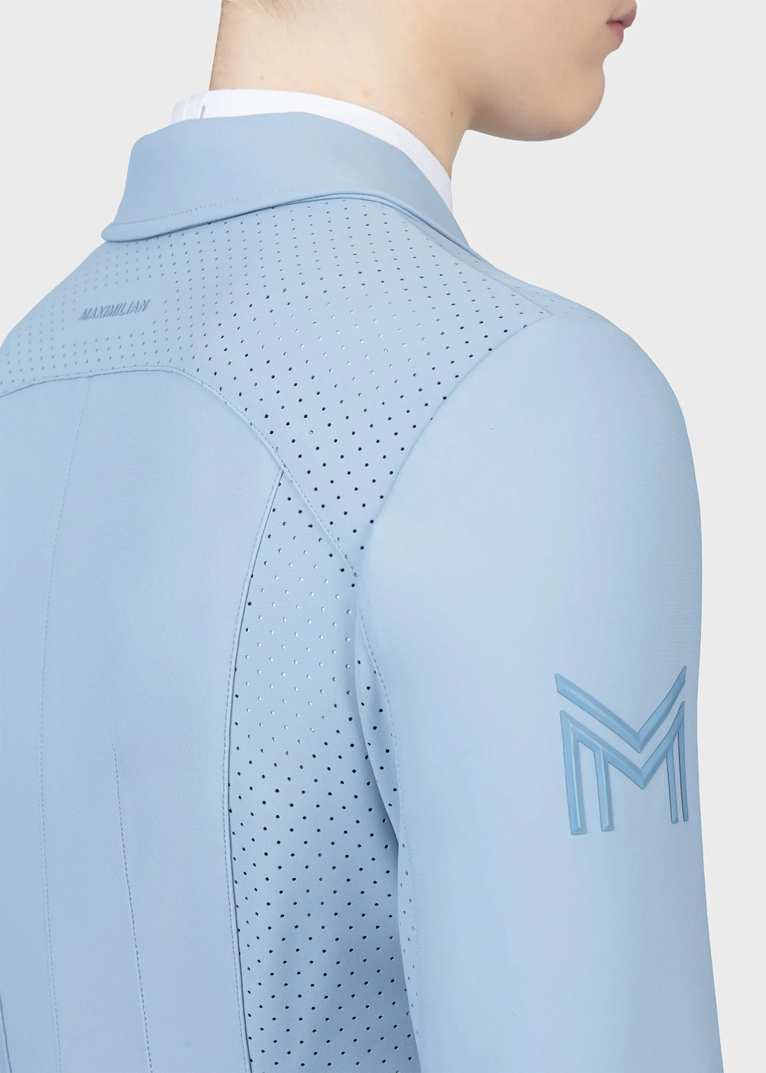 Aqua | Aura Show Jacket – MAXIMILIAN Equestrian, close-up of the perforated back panel with logo