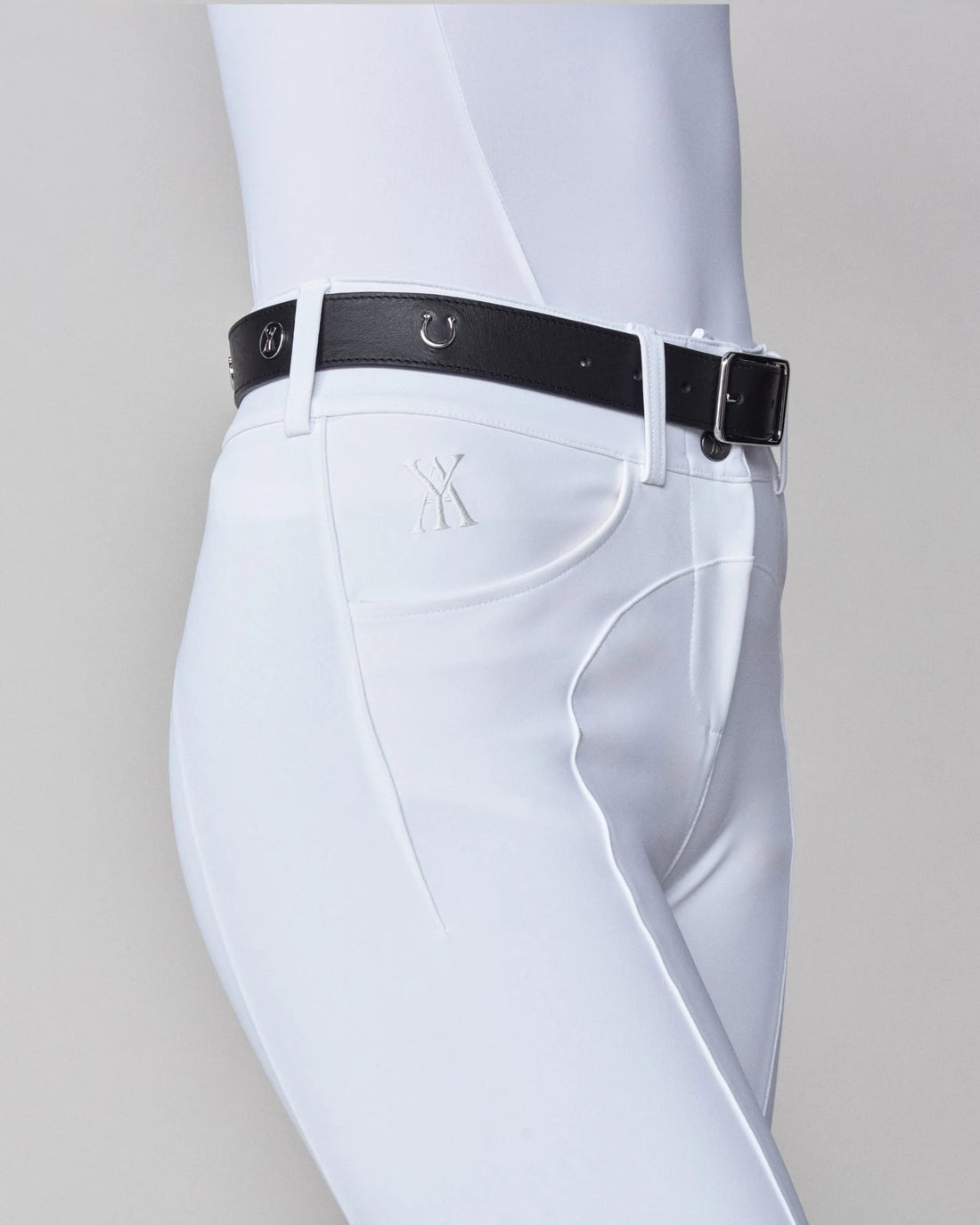 Black | Leather Buckle Belt, close-up of the belt at the waistband