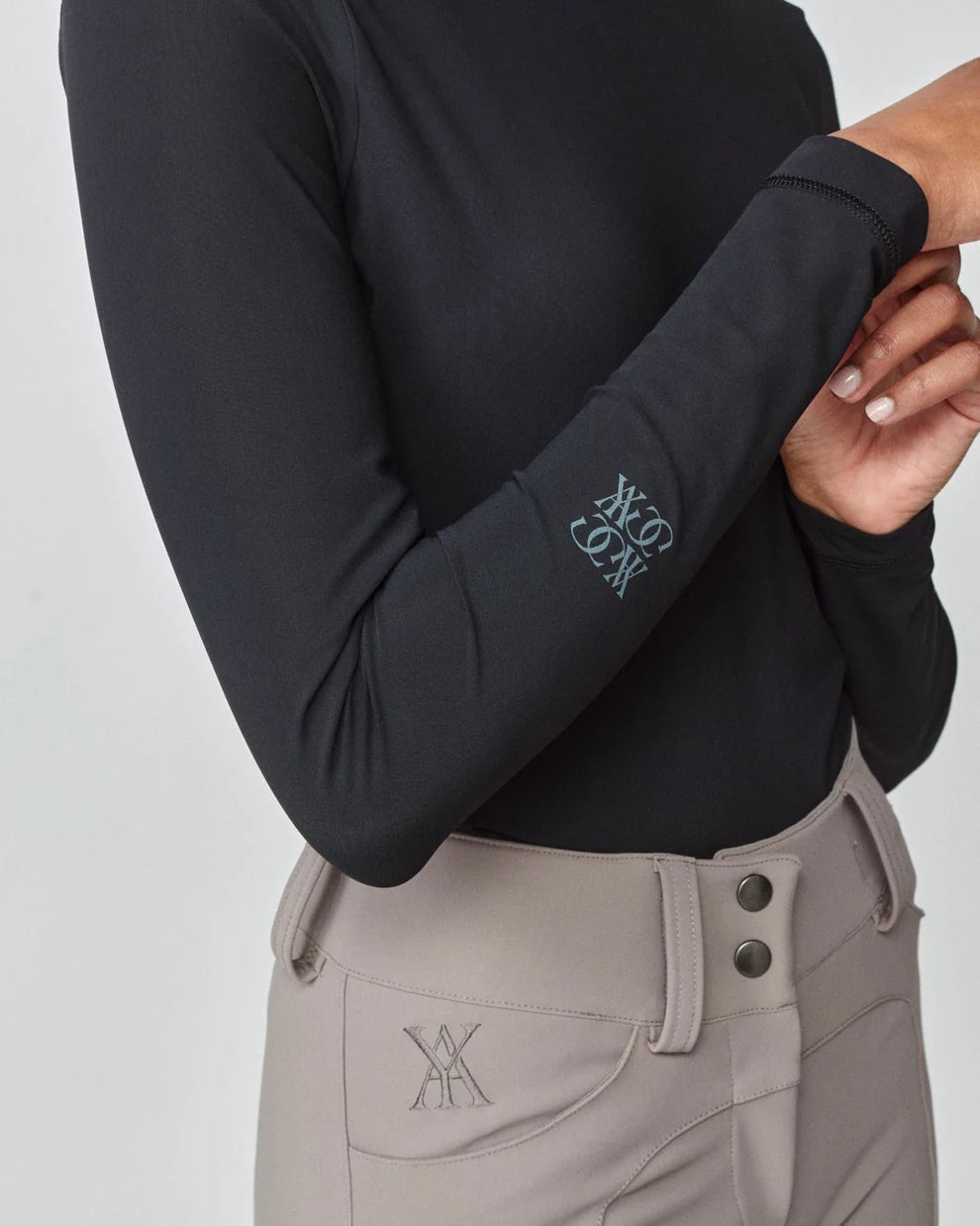 Black | Lightweight Long Sleeve, close-up of the sleeve and cuff logo