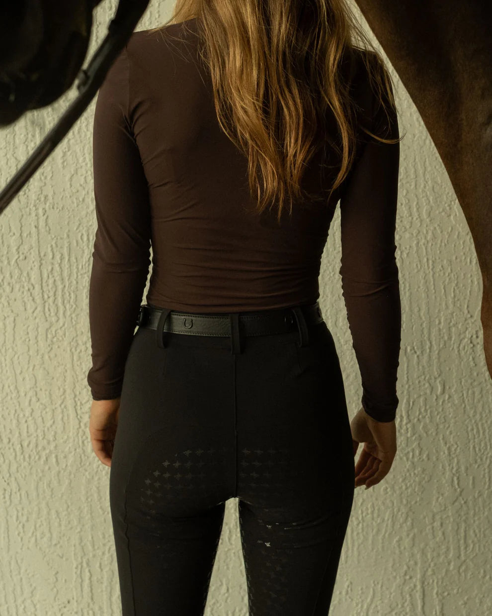Black | Timeless Riding Breeches, riding breeches on model beside a horse