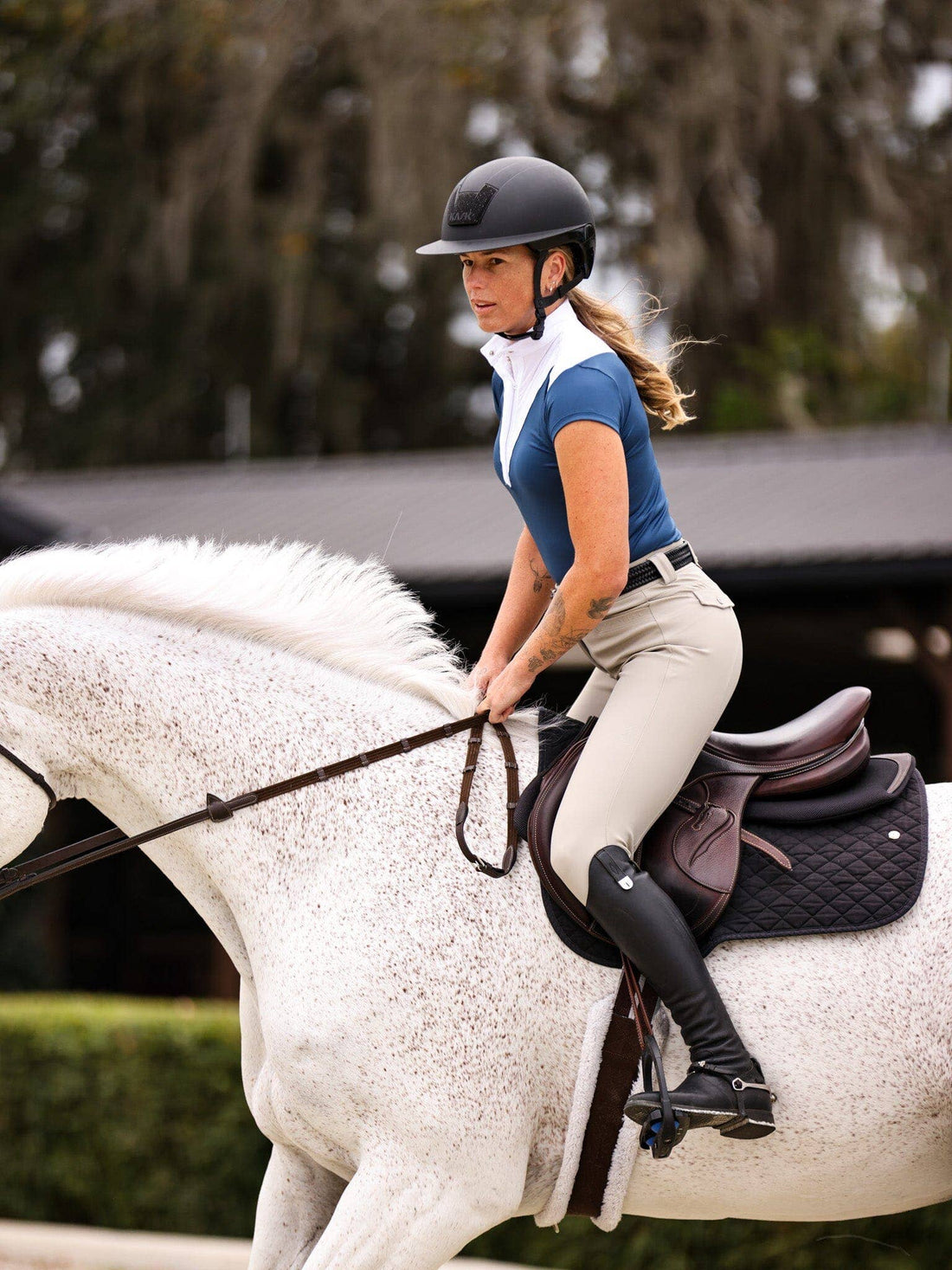 Marine Navy | Margot Show Shirt, on a rider mounted on a grey horse