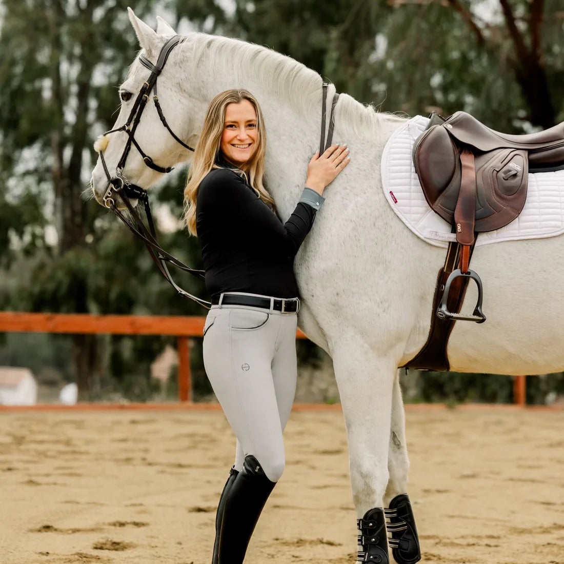 Hunter Beige | Halter Ego Evolution Mid Waist Ladies Knee Patch Breeches, knee patch breeches on model beside a grey horse